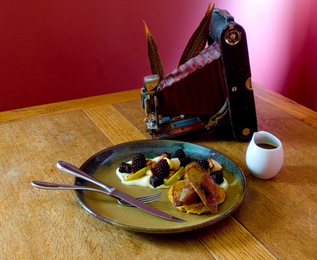 Roast pigeon with pickled blackberries, parsnip puree, black pudding, apple and potato rosti - Juani
